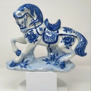 Vintage Chinese porcelain show horse statue.